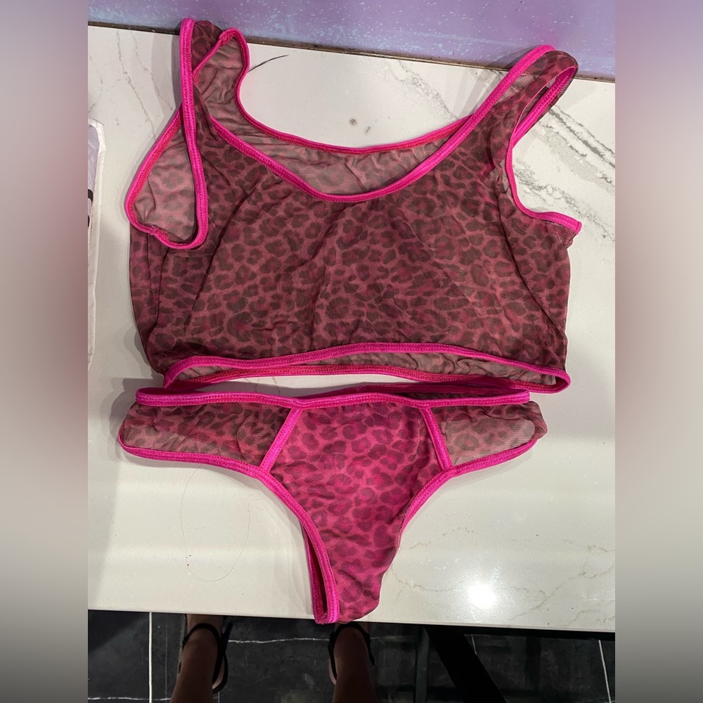 Two piece exotic dance wear. Sheer, pink leopard print.
